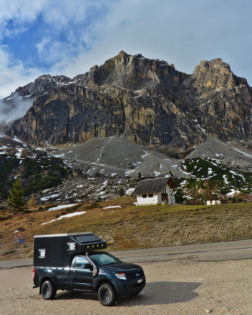 Our beloved overlanding pickup in the Alps